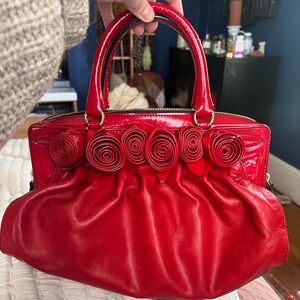 Valentino Garavani red rose handbag (originally $1895).